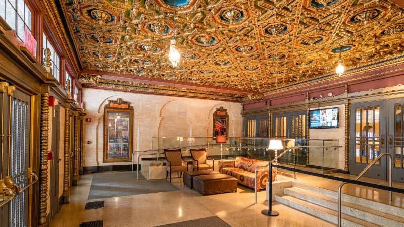 The entrance of the Indiana Repertory Theatre with a golden ceiling.